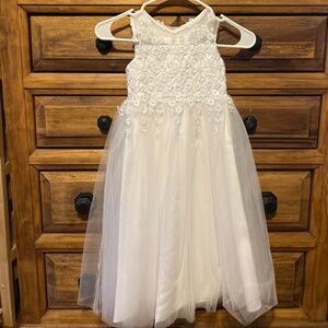 Sleeveless white lace dress
